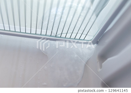 Ice in the fridge. Problem of forming ice in working fridge 129641145