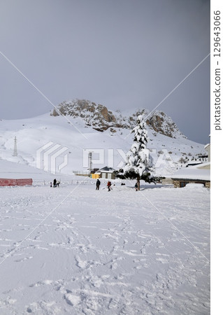Snowy mountain ski-lift no people, blue sky, azure, air, freshness, ecology. High quality photo 129643066