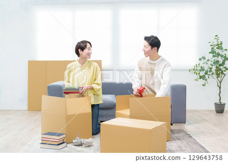 A young couple preparing to move 129643758
