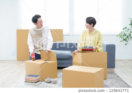 A young couple preparing to move 129643771