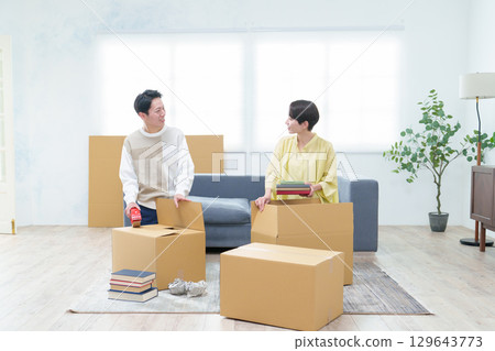 A young couple preparing to move A young couple preparing to move 129643773