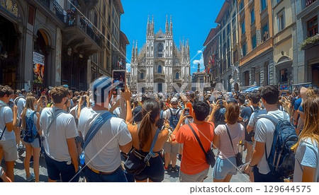 Milan Cathedral captured by tourists on a sunny day in Italy, sh Milan Cathedral captured by tourists on a sunny day in Italy, sh 129644575