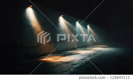 Dimly lit urban alleyway with textured concrete walls, illuminated by overhead lights casting dramatic shadows, creating a mysterious and atmospheric scene for visual storytelling 129645511