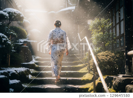 Snowy old townscape and a woman in a kimono Snowy old townscape and a woman in a kimono 129645580