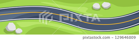 Overhead view of a winding road with a yellow center line. Asphalt road curves through a bright green landscape. Decorative stones on both sides of the road. Overhead view of a winding road with a yellow center line. Asphalt road curves through a bright green landscape. Decorative stones on both sides of the road. 129646809