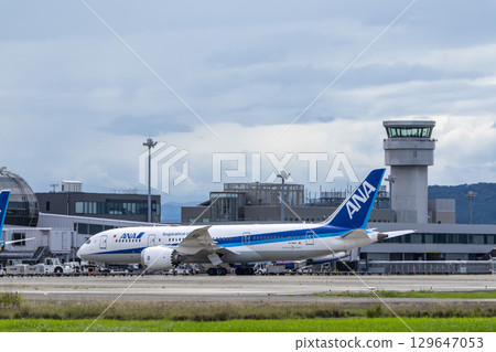 Sendai Airport in summer, towing tractor and airplane, Natori City, Miyagi Prefecture Sendai Airport in summer, towing tractor and airplane, Natori City, Miyagi Prefecture 129647053