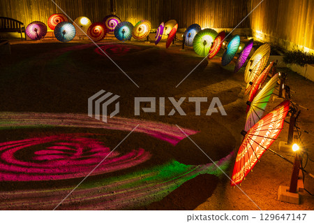 Winter in Kurashiki City, Okayama Prefecture: Kurashiki Bikan Historical Quarter at night, illuminated with Japanese umbrellas 129647147