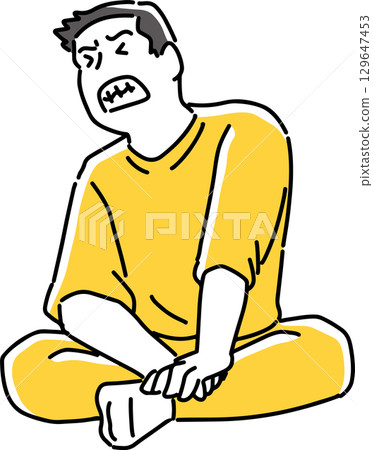 A frustrated man sitting cross-legged 129647453