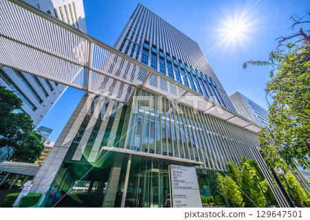 Tokyo cityscape in Japan. Intense heat...scorching sunlight...view of Chiyoda Ward Office and other buildings. Towards a new era = August 15th 129647501