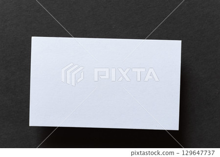 white card on black background 129647737