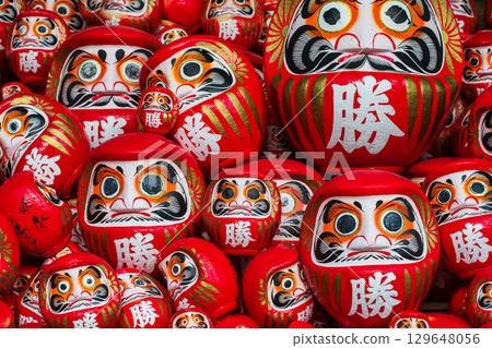 Many Daruma dolls on shelf decor at Katsuo-ji temple, Minoh, Osaka 129648056