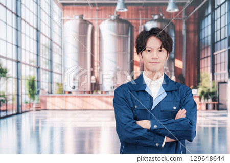 A man working at a brewery 129648644