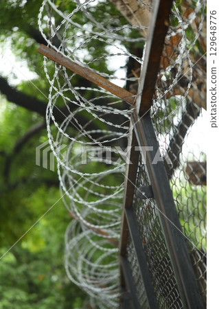 Abstract Metal Fence at Jail wall 129648776