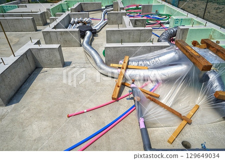 Large air conditioner installed at a construction site Large air conditioner installed at a construction site 129649034