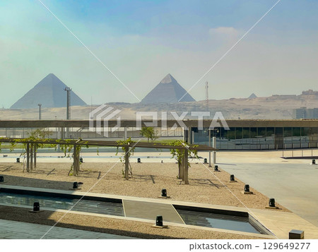 The Great Pyramids of Giza viewed from the Grand Egyptian Museum 129649277