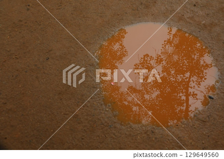 Rain water puddle on Road Rain water puddle on Road 129649560