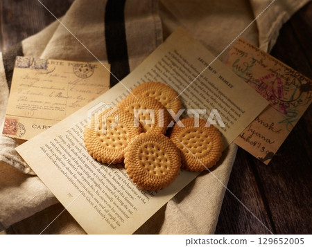 Biscuits and cards on the table 129652005