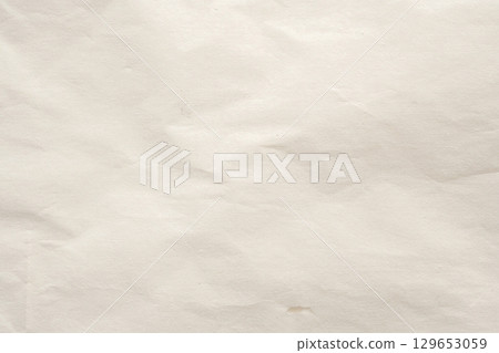 Abstract white crumpled and creased recycle paper texture background 129653059