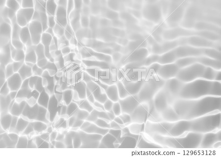 Abstract white transparent water shadow surface texture natural ripple background 129653128