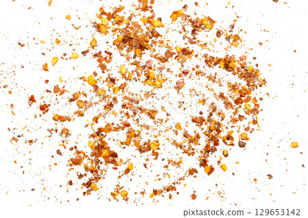 dried red chili pepper flakes and seeds isolated on white background 129653142