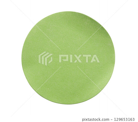 Blank green round adhesive paper sticker label isolated on white background 129653163