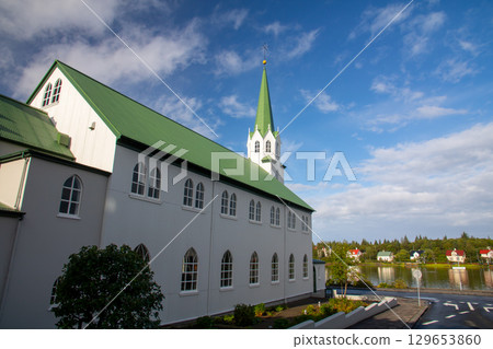 Reykjavik Free Church, located on the shores of Lake Tjörnin in the capital city of Reykjavik, a Nordic island nation in Iceland Reykjavik Free Church, located on the shores of Lake Tjörnin in the capital city of Reykjavik, a Nordic island nation in Iceland 129653860