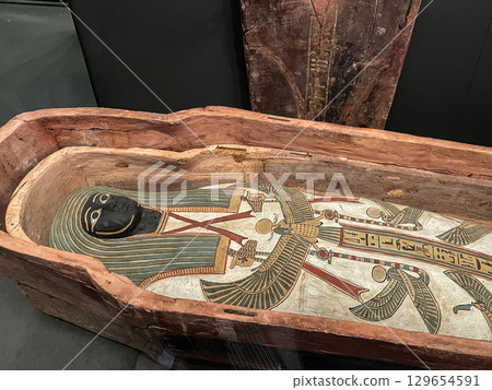 Coffins and mummy shrouds on display at the Grand Egyptian Museum in Giza 129654591