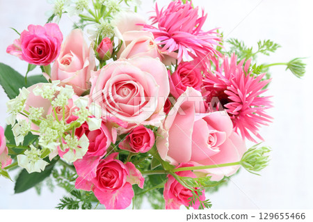 Pink rose and gerbera arrangement 129655466