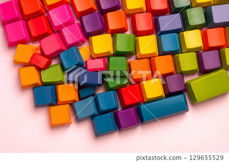 the colored keys of a keyboard scattered the colored keys of a keyboard scattered 129655529