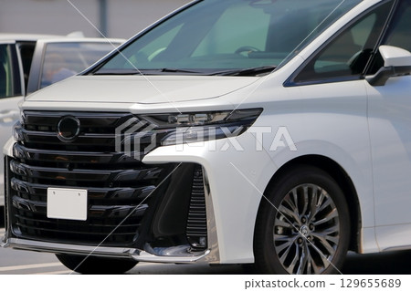 White minivan image White minivan image 129655689