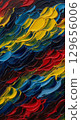 A dynamic, abstract painting representing a 'symphony of colors.' The canvas is filled with swirling, fluid motions of vibrant paints deep blues, energetic yellows, and fiery reds 129656006