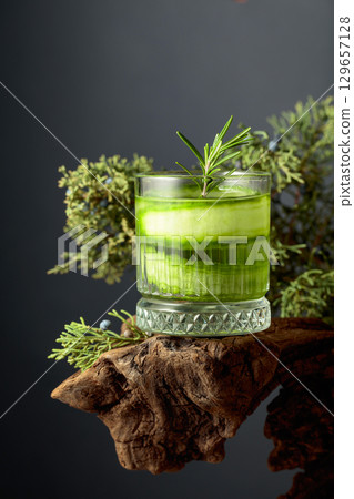 Refreshing hard seltzer with ice, cucumber, and rosemary. Refreshing hard seltzer with ice, cucumber, and rosemary. 129657128