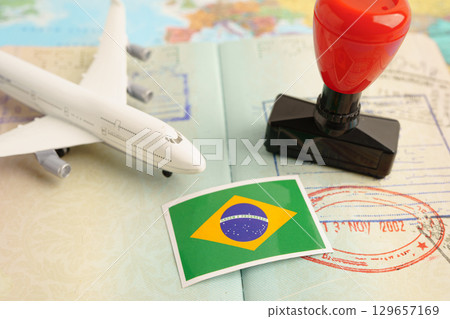 Brazil passport with approved stamp on document for tourism to immigration at airport in country. 129657169