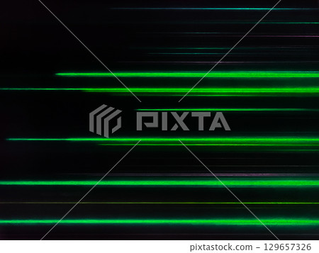 A black background image with many thin rays of light, such as green, arranged in straight lines. A black background image with many thin rays of light, such as green, arranged in straight lines. 129657326
