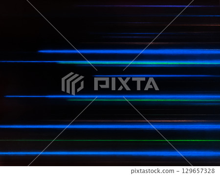 A black background image with many thin rays of light, such as blue, arranged in straight lines. A black background image with many thin rays of light, such as blue, arranged in straight lines. 129657328