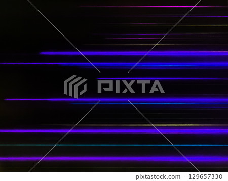 A black background image with many thin rays of light, such as purple, arranged in straight lines. 129657330