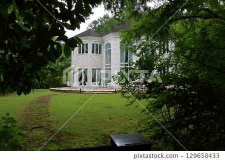 The paths around the lake and gardens of the Lake Garden in the Japanese resort town of Karuizawa in the Nagano Alps.  129658433