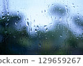 Window glass wet in the rain 129659267