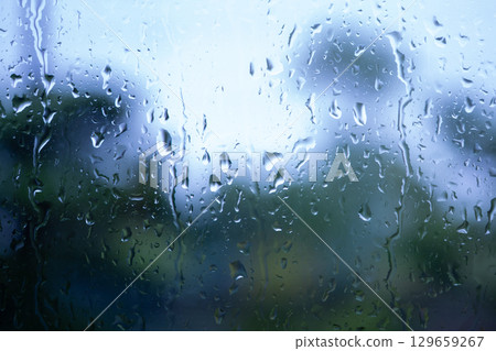 Window glass wet in the rain 129659267