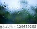 Window glass wet in the rain 129659268