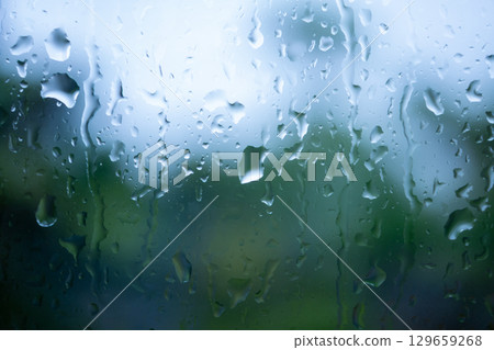 Window glass wet in the rain 129659268