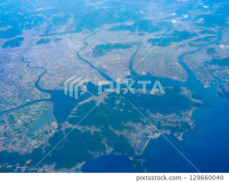 View of Okayama city from inside the plane flying to Fukuoka View of Okayama city from inside the plane flying to Fukuoka 129660040