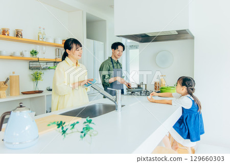 Family cooking in the kitchen 129660303