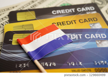 Netherland flag on credit card, finance economy trading shopping online business. 129660499