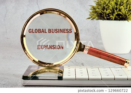 GLOBAL BUSINESS EXPANSION Concept Text. Global digital interface technology and networking concept 129660722