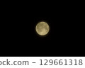 Close-up photo of the full moon, central composition 129661318
