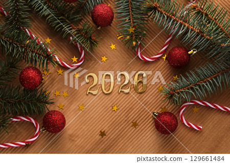 New Year 2025 beige background. Number of the coming year in Christmas decoration. 129661484