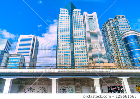 Yokohama cityscape in Japan, including graffiti under the elevated railway and the Yokohama Landmark Tower in front of Sakuragicho Station (August 2nd) 129661565