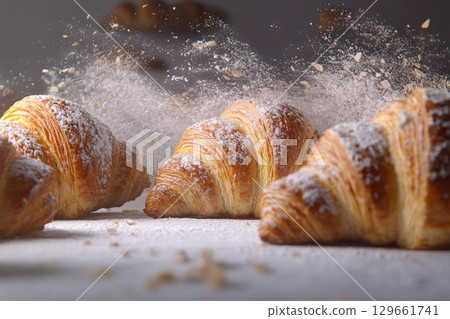 Freshly Baked Croissants Dusted With Flour in a Delightful Kitchen Moment Generative AI 129661741
