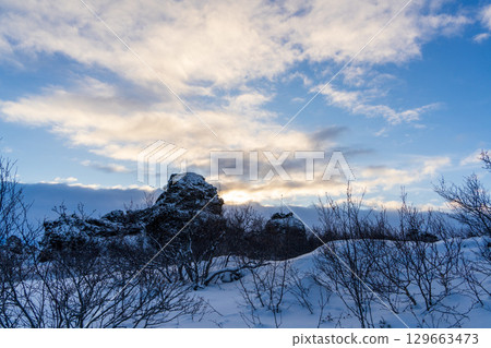 Snowy landscape of Dimmuborgir lava field, Lake Myvatn, Iceland at sunset Snowy landscape of Dimmuborgir lava field, Lake Myvatn, Iceland at sunset 129663473